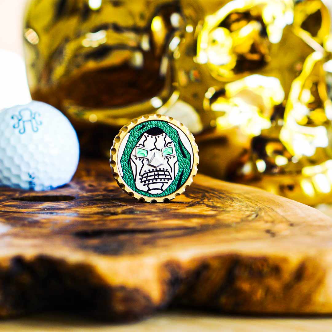 Close-up of handcrafted golf tools featuring leather, brass, and copper inlays - showcasing artisan craftsmanship by Kraken Golf