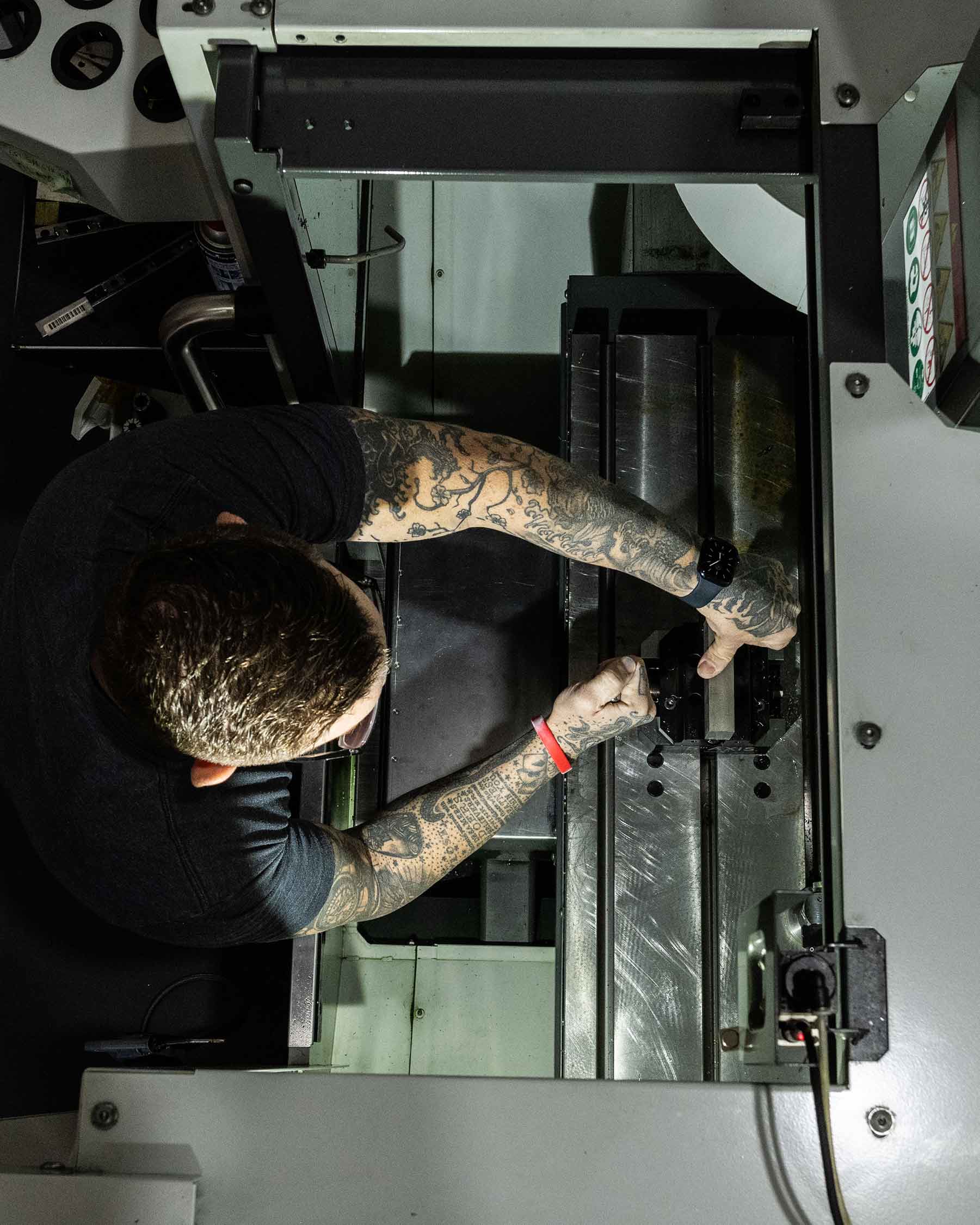 Craftsman at work on CNC machine – creating heirloom-quality golf gear