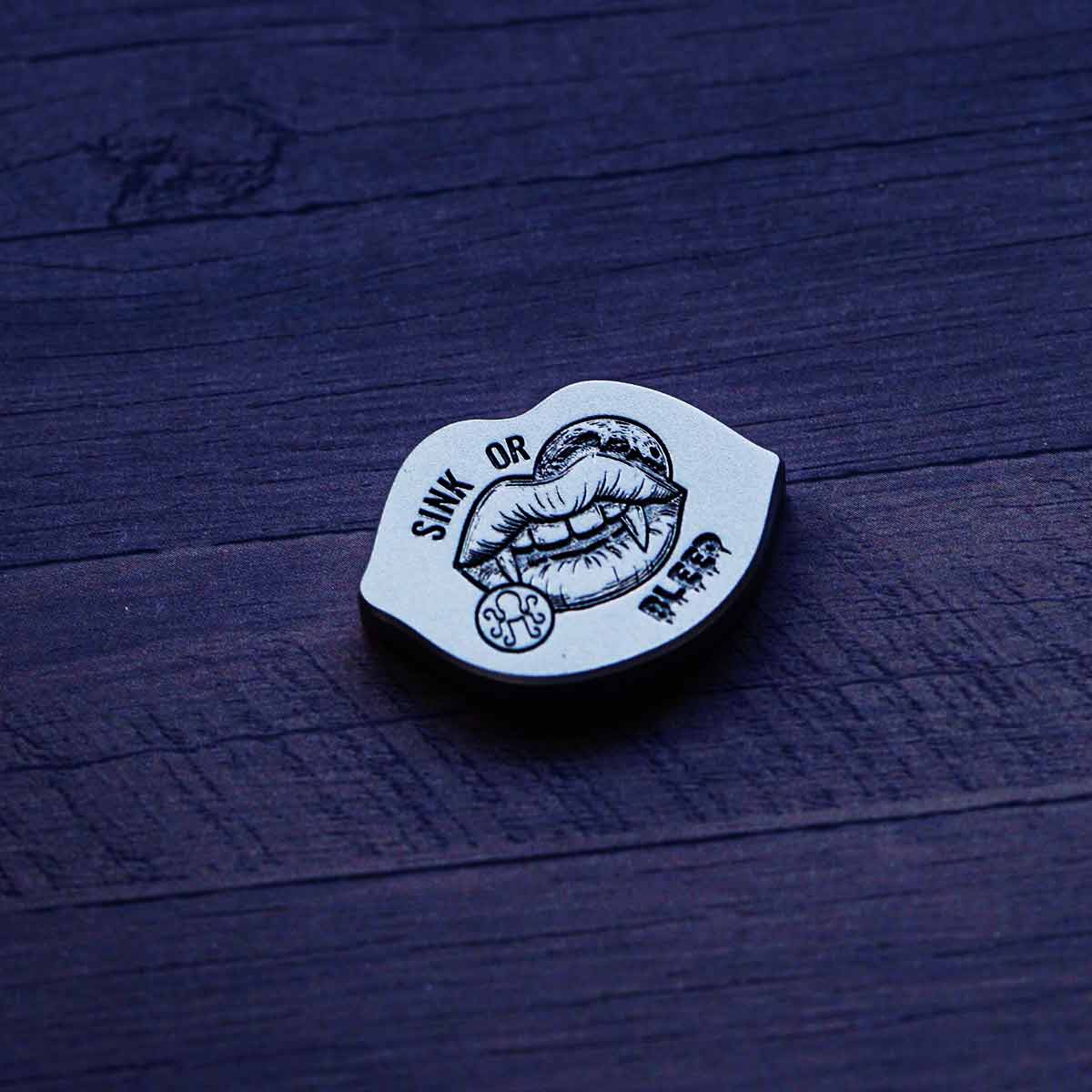 Kraken Golf collectible Blood Moon marker with Sink or BLEED engraving