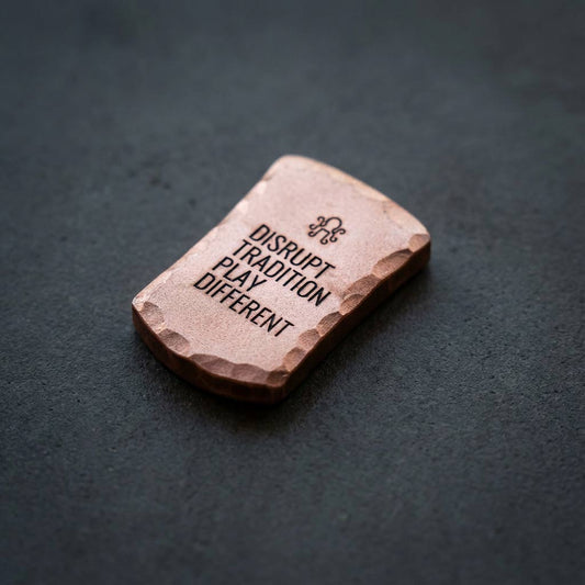 Back engraving detail on copper golf ball marker