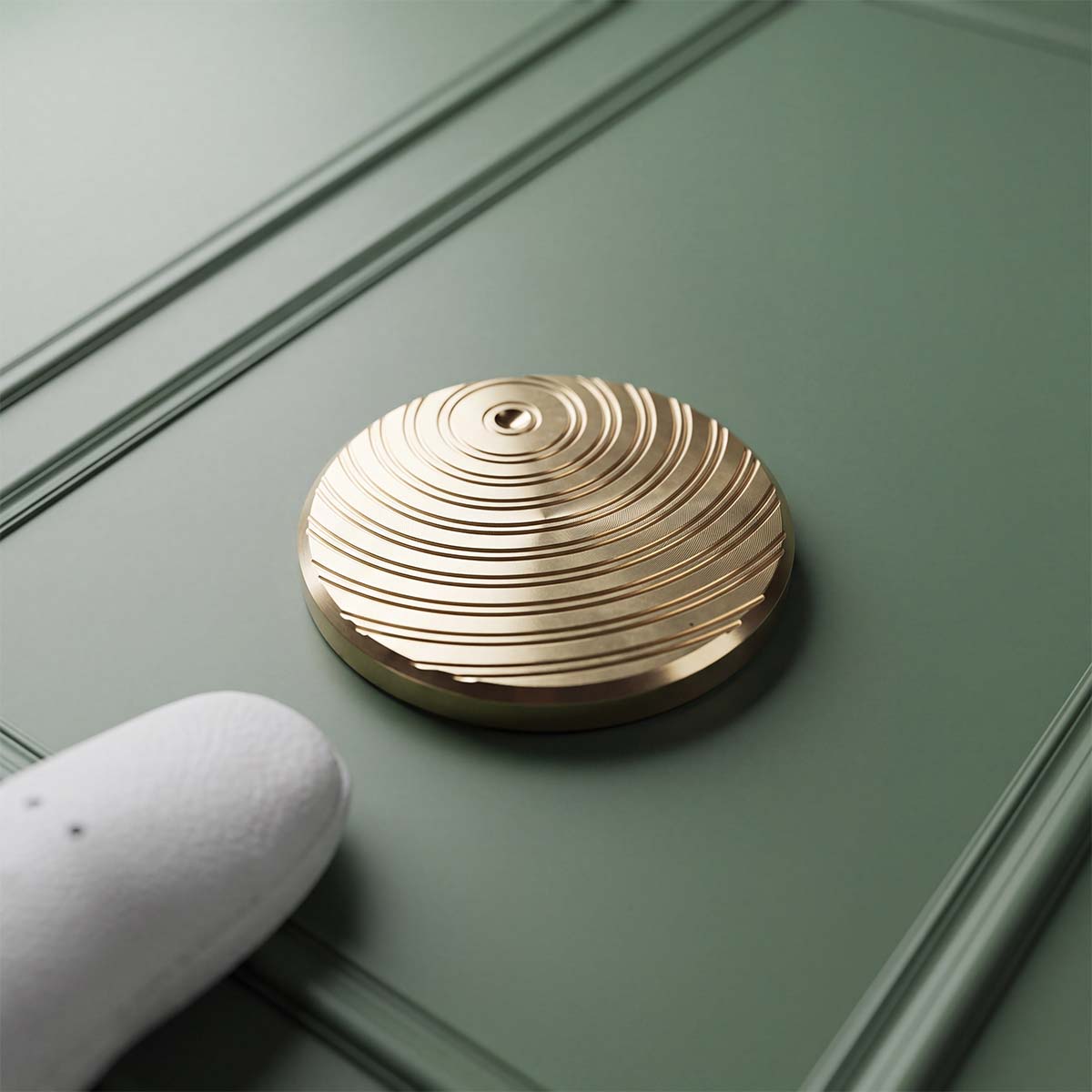 Brass ball marker back engraved with Air Force 1 sole tread pattern