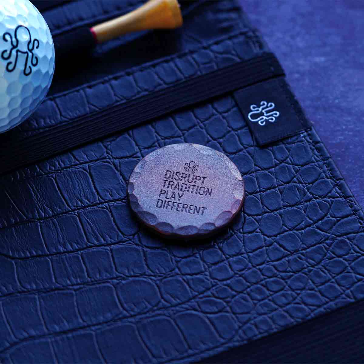 Aged copper Hobo Luck golf marker with burnished highlights and engraved back