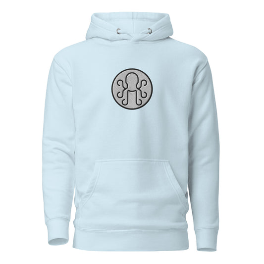 Sky blue Kraken Golf hoodie with bold white and black embroidered logo on the chest
