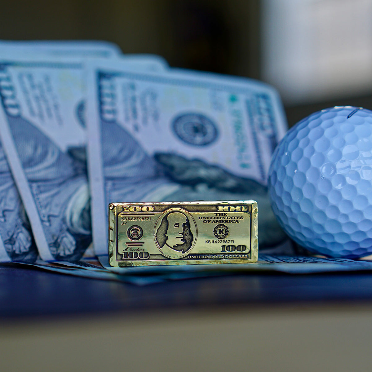 Kraken Golf $100 bill-shaped marker with hammered border and luxe shine