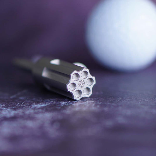 Stainless steel divot tool with revolver-style barrel design and single prong