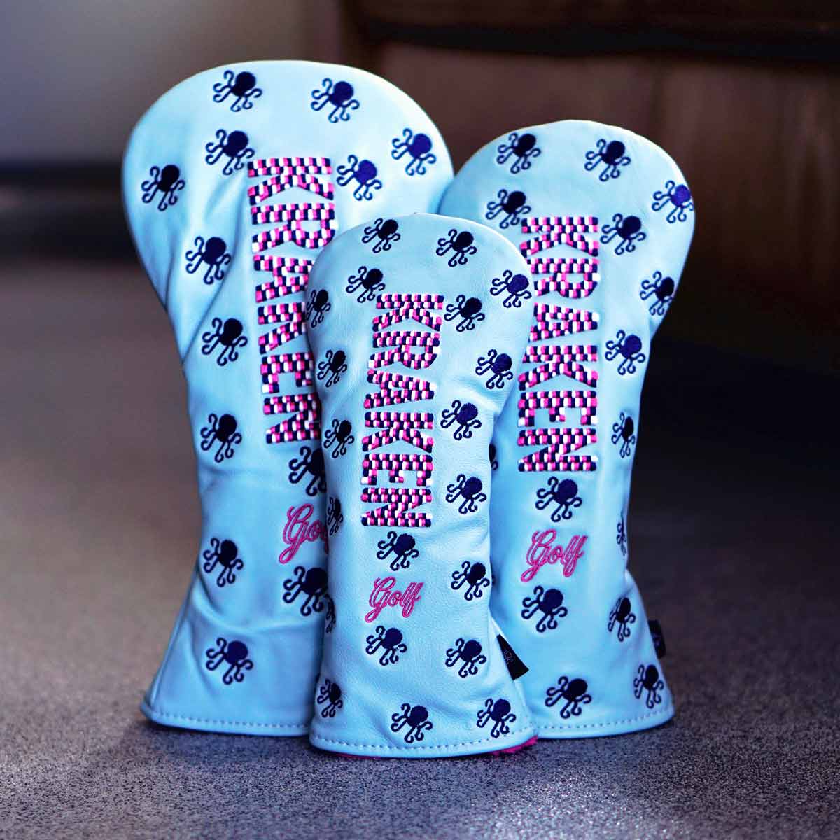 Vice Baby leather golf headcover set by Kraken Golf in baby blue with pink, white, and navy embroidery