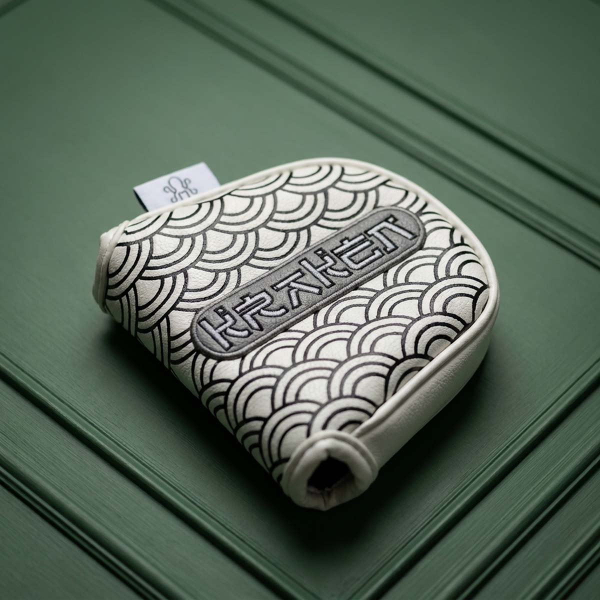 White Seigaiha mallet putter headcover with graphite KRAKEN wordmark badge and woven tab, Kraken Golf