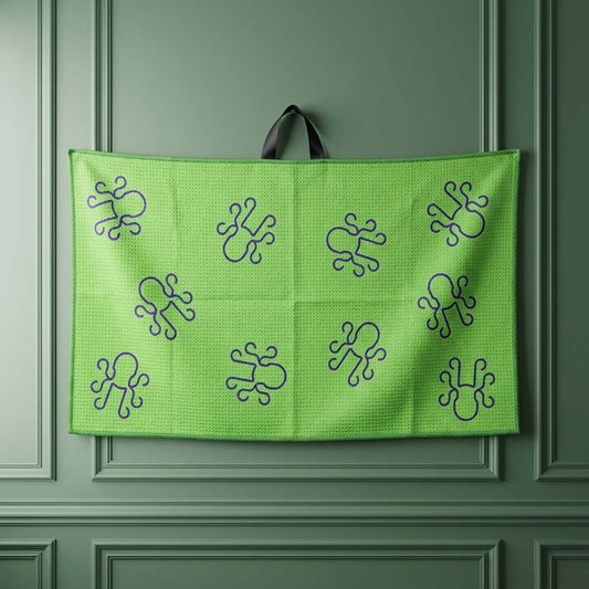 27 by 15 inch green golf towel with purple Kraken logo and lightning bolt graphics