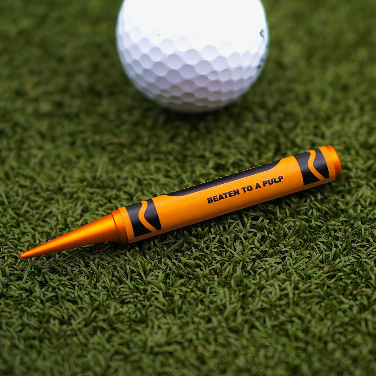 Beaten to a Pulp - Orange Crayon Divot Tool - Kraken Golf