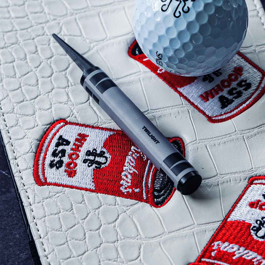 the Kraken Golf pitch tool known as Twilight and shaped like a black crayon