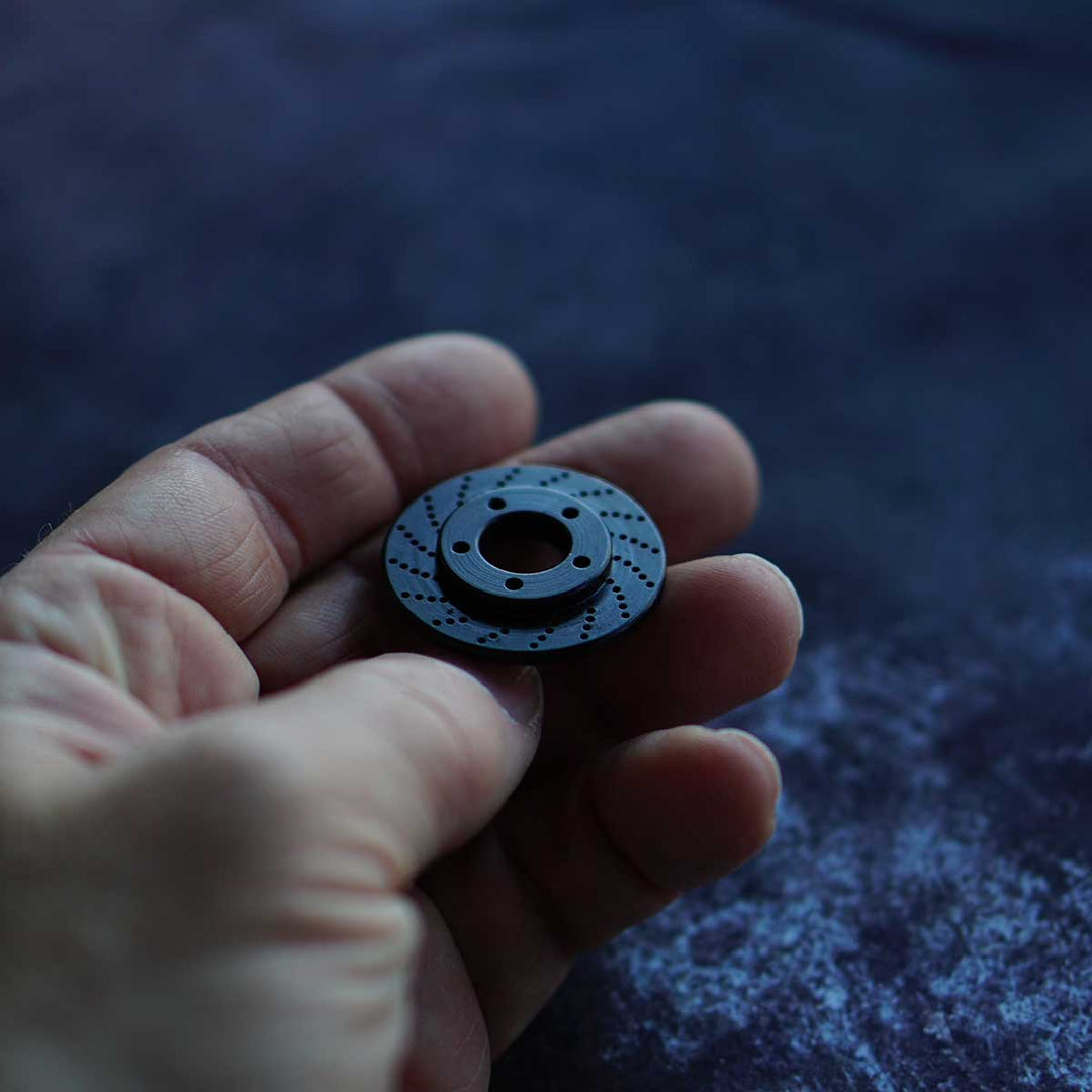 Black oxide rotor golf ball marker in carbon steel