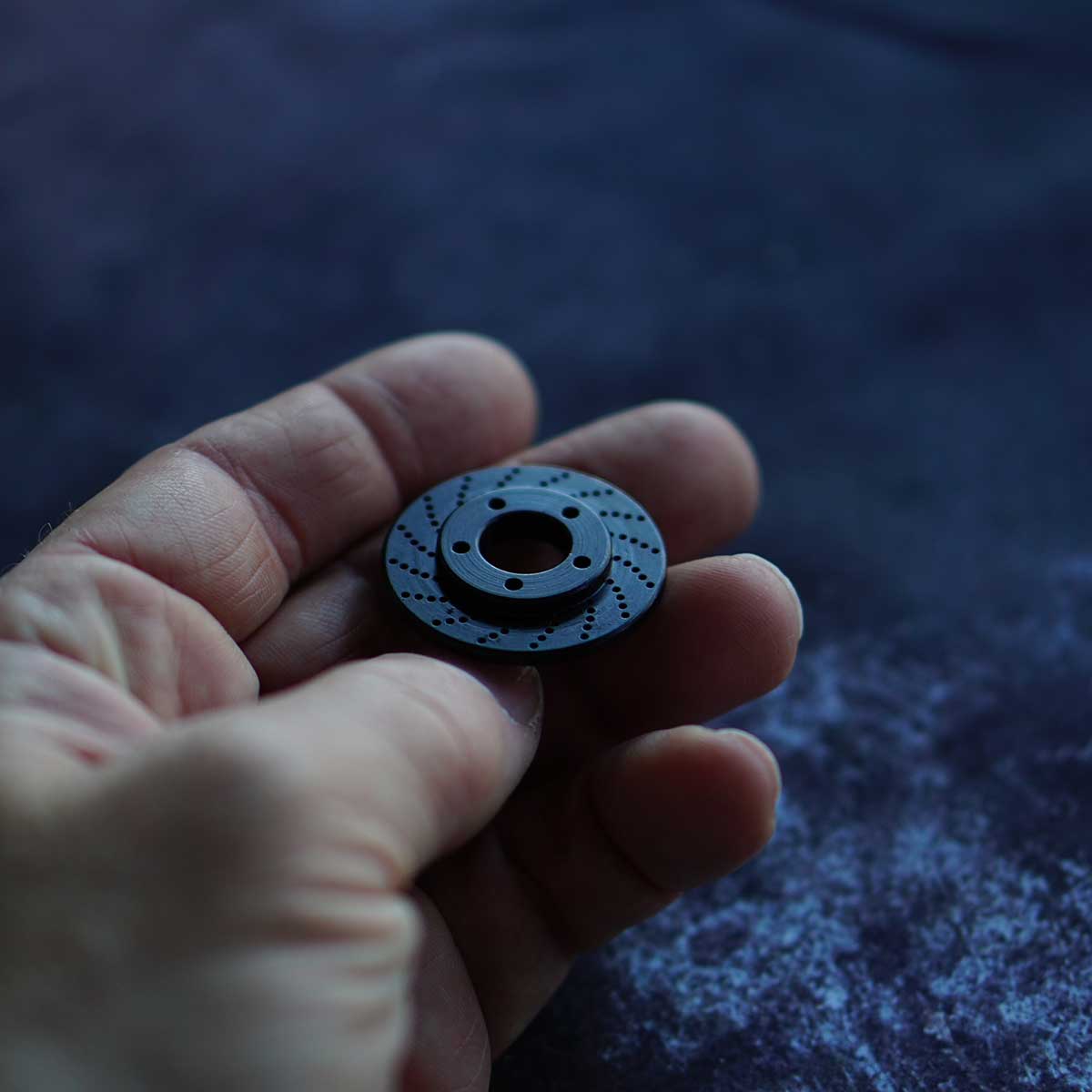 Black oxide rotor golf ball marker in carbon steel