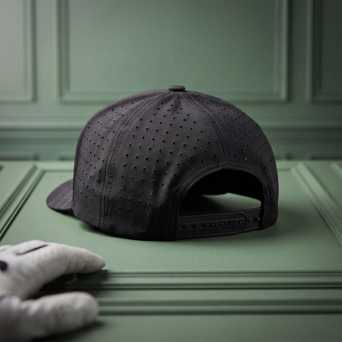 Kraken Golf Blackout snapback golf hat, laser-perforated 5-panel crown