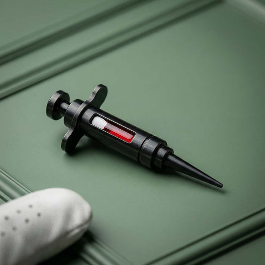The Bloodline Pitch Tool in black oxide carbon steel with stainless steel inlays and red translucent side fill by Kraken Golf