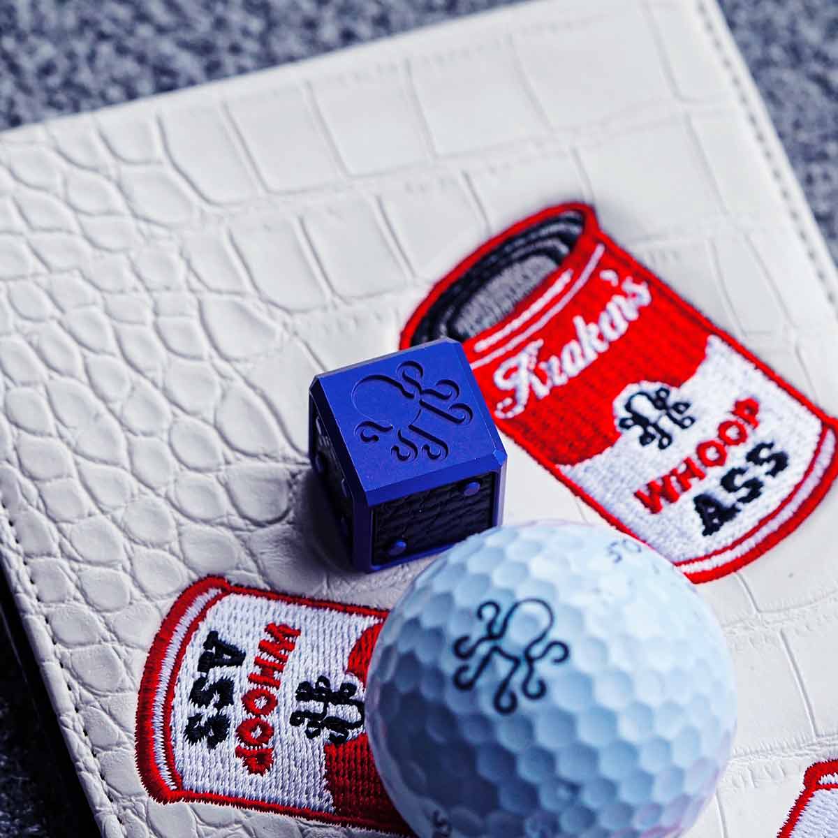 Kraken leather-inlay die on a leather yardage book