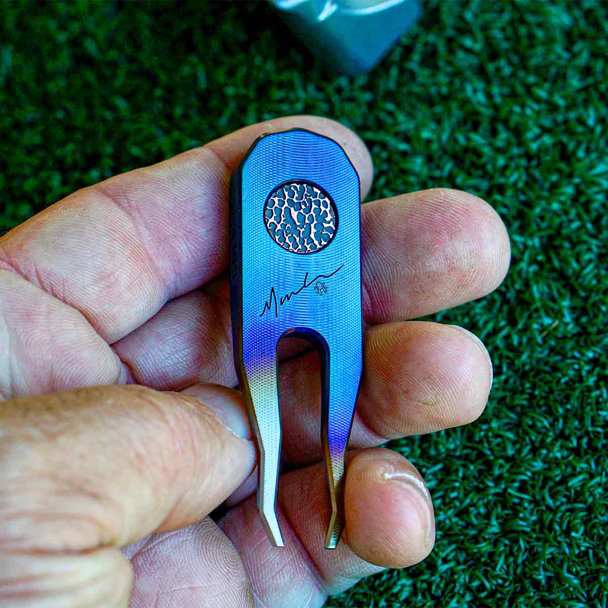 Limited-edition Blue Inferno golf divot repair tool - angled view