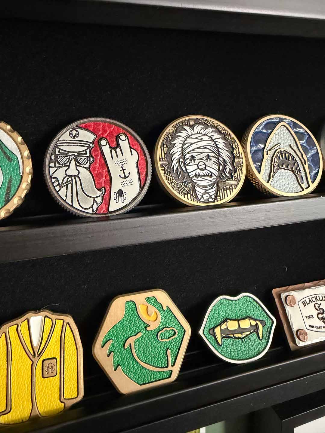 Collection of colorful Kraken golf items on a shelf. 