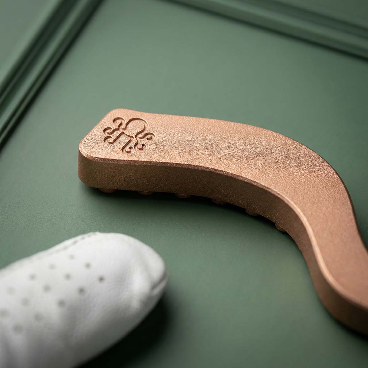 Close-up of Kraken pitch tool in copper.