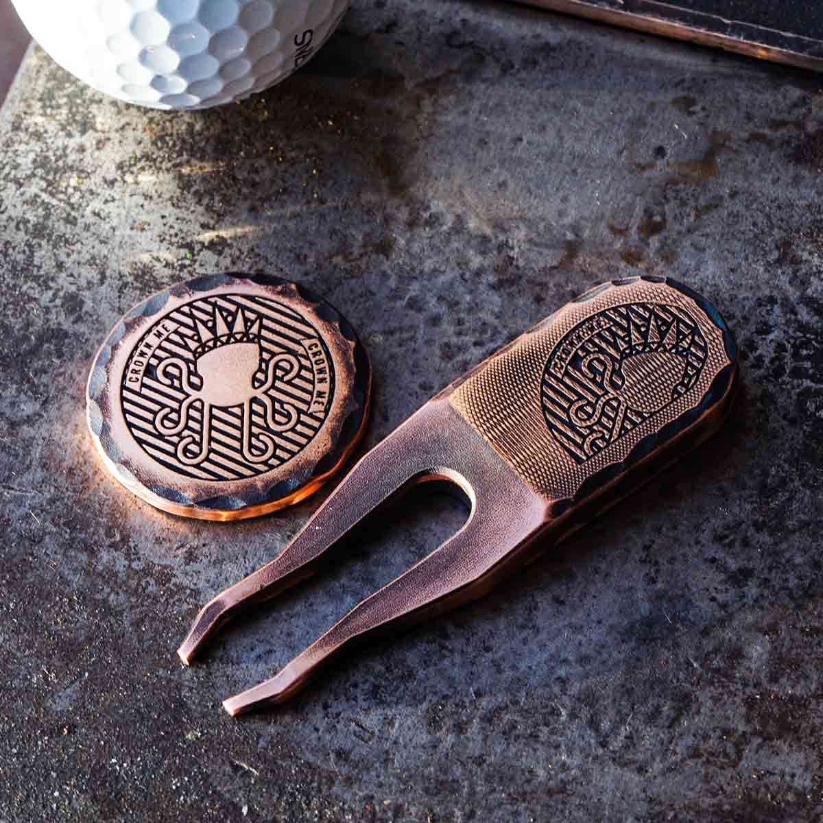 Copper golf marker and pitch tool set with hammered edges and bold patina finish