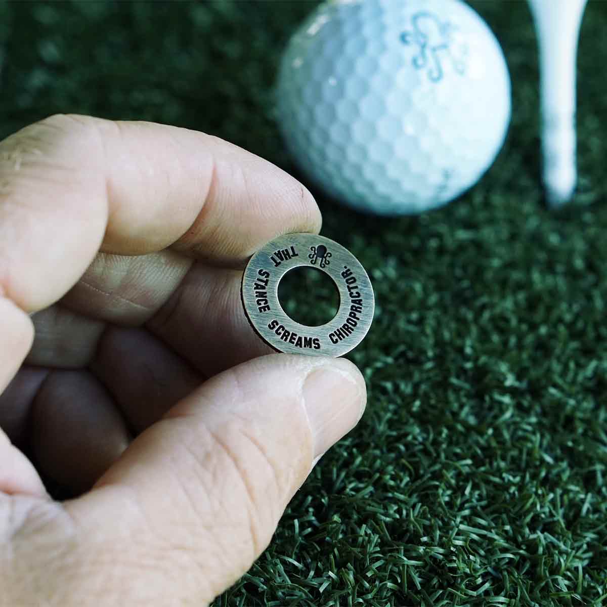 Washer ball marker with engraved insults and paisley skull design