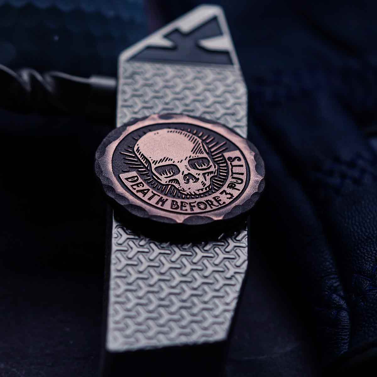 engraved skull golf ball marker by Kraken Golf