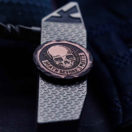 engraved skull golf ball marker by Kraken Golf