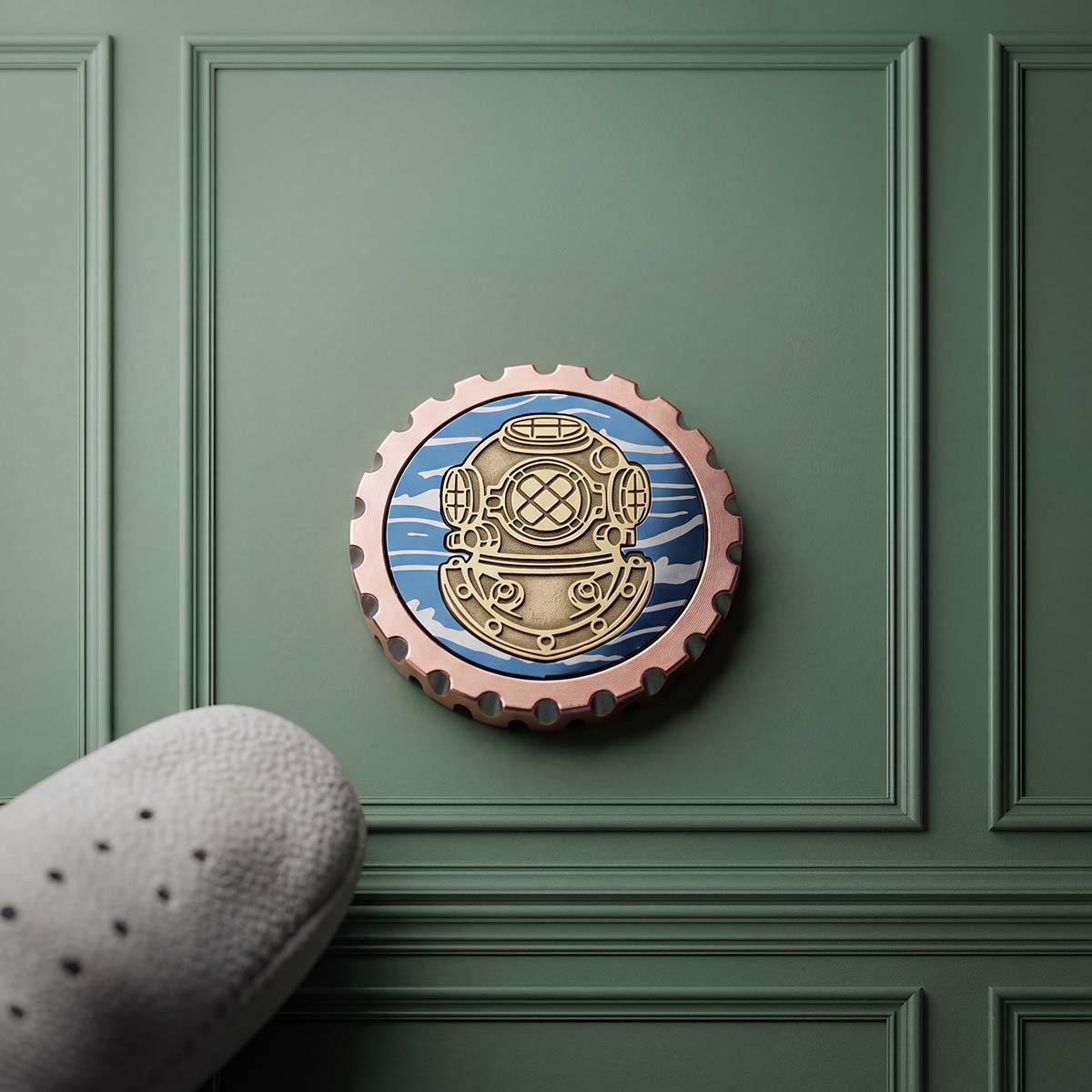 Hardhat copper golf ball marker with scalloped edge, blue laser-annealed stainless steel wave inlay and brass diving helmet, Kraken Golf Den drop