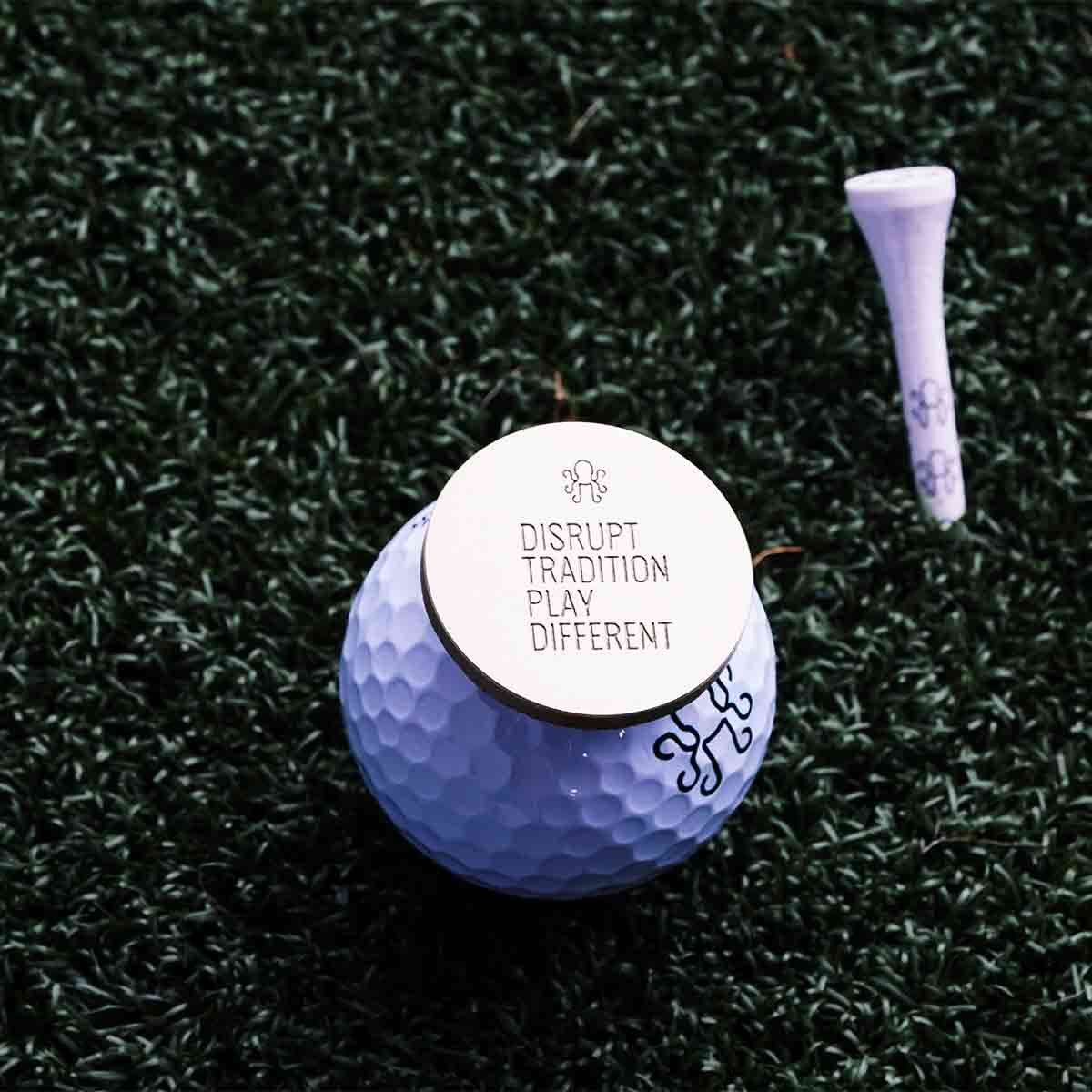 Kraken Golf Hinode Legacy marker, a collectible brass golf ball marker with heirloom finish.