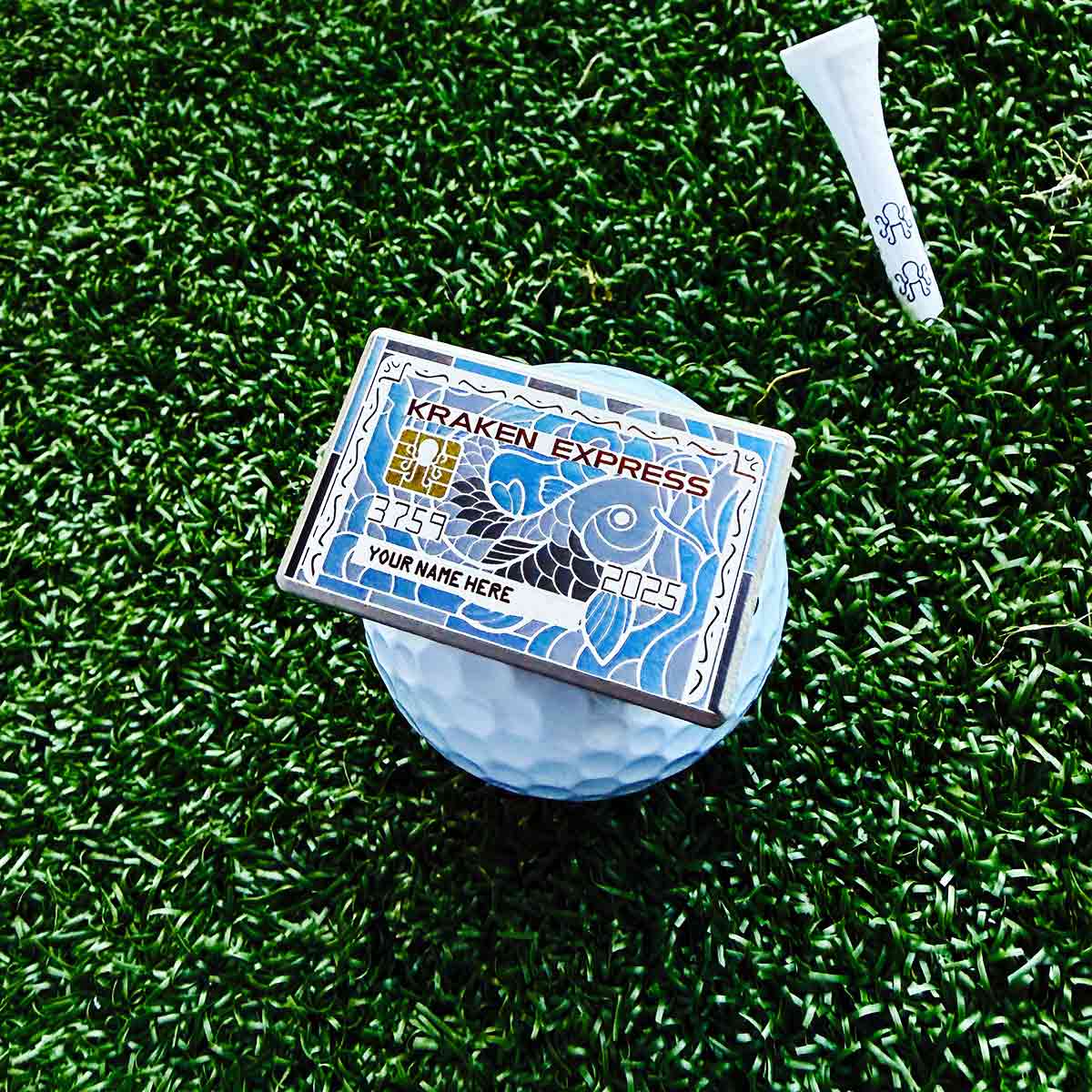Personalized titanium golf ball marker engraved with custom name Kraken Koi Express