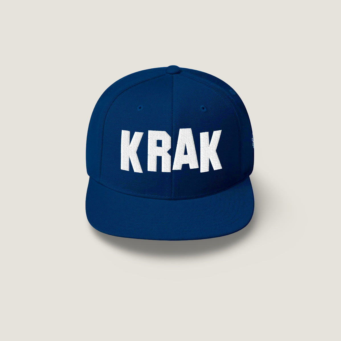Navy snapback golf hat with bold white KRAK lettering
