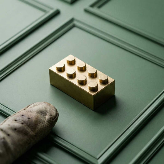 Kraken Brix golf ball marker on green background