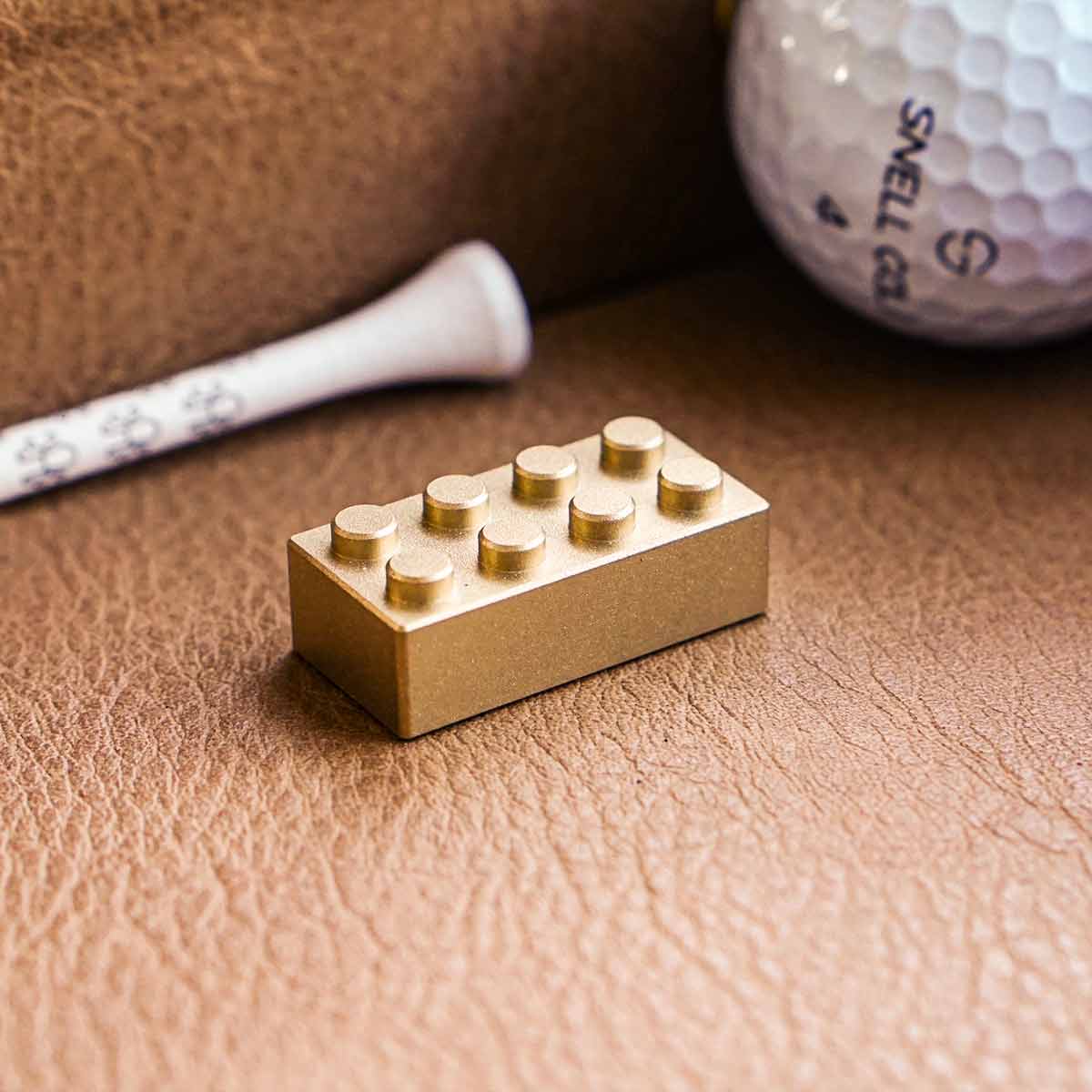 Kraken Block brass golf ball marker - top view
