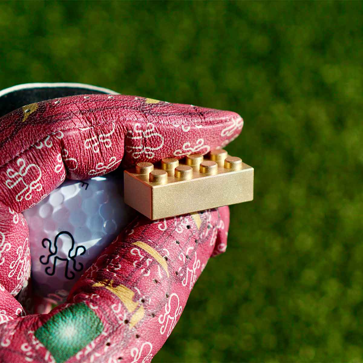 Kraken Block brass golf ball marker - top view