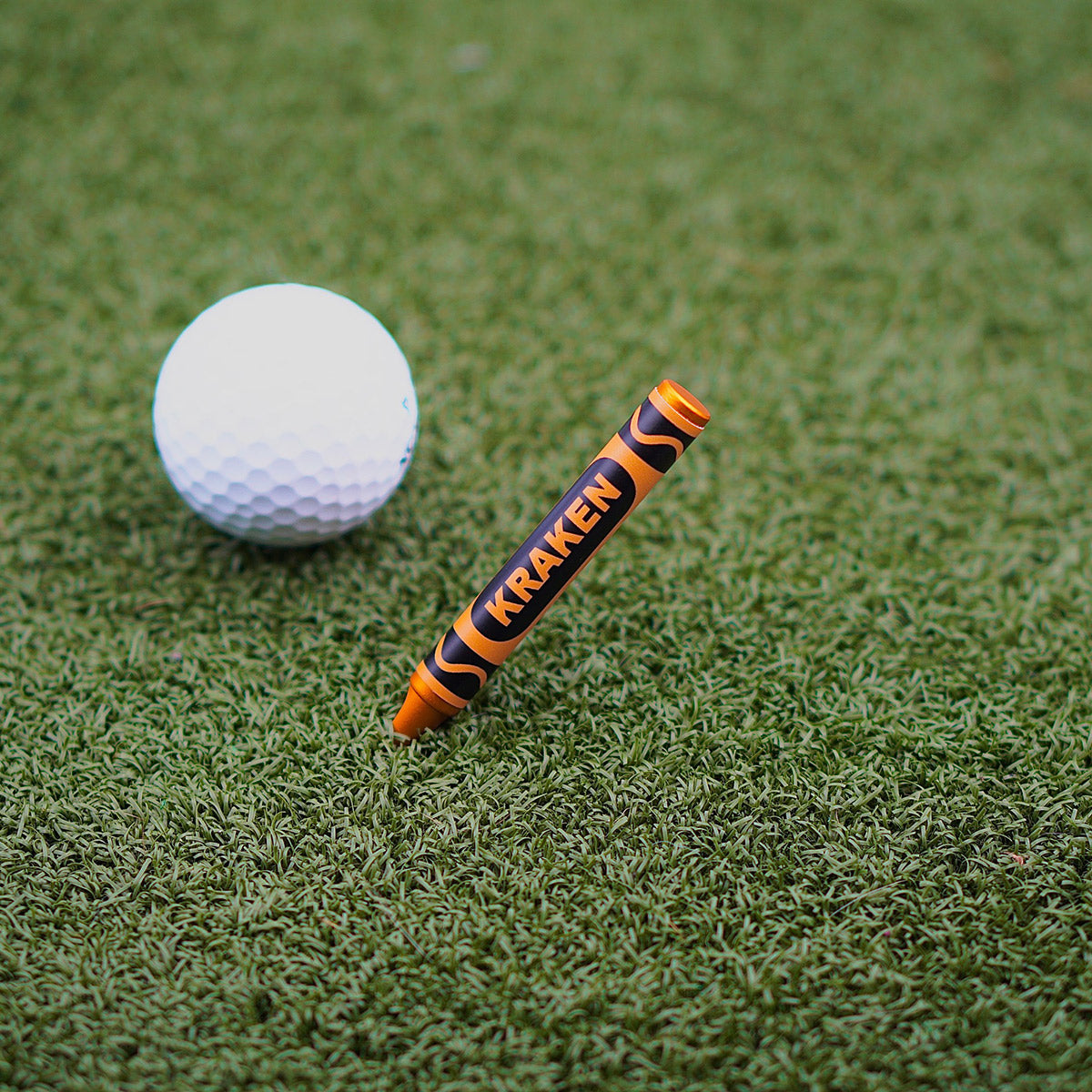 Beaten to a Pulp - Orange Crayon Divot Tool - Kraken Golf