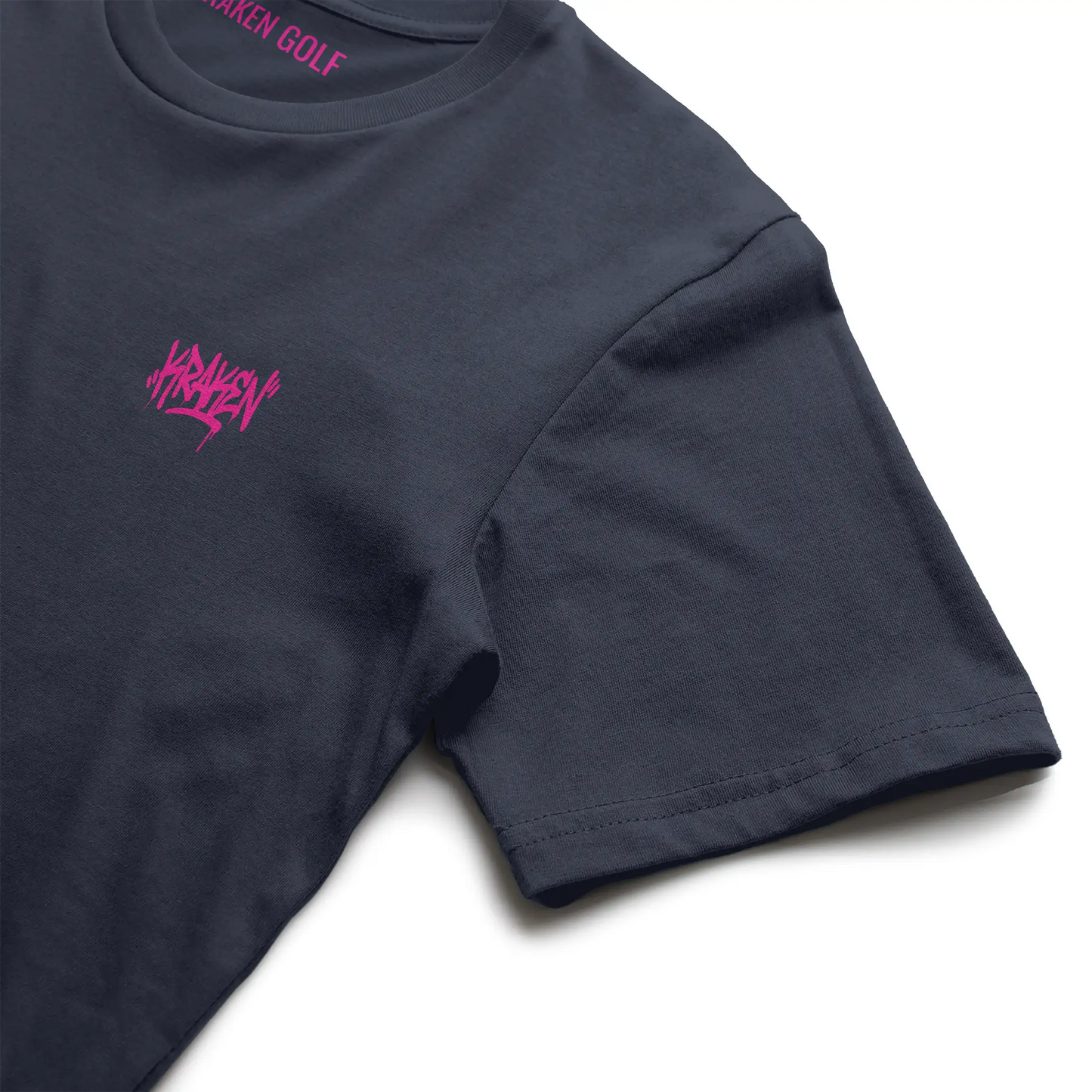 Kraken-pink interior neck print inside the navy Origin tee from Kraken Golf