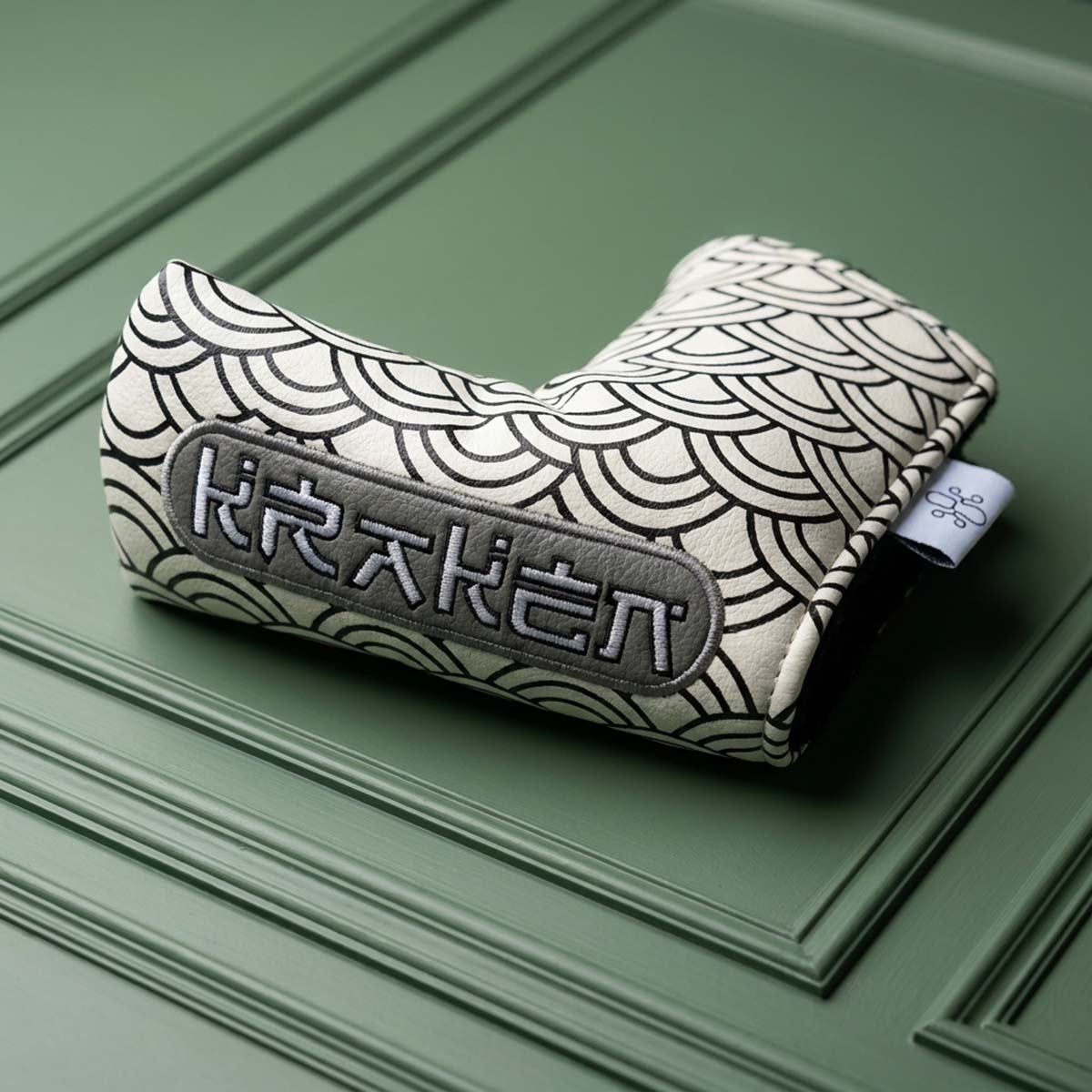 Ivory white blade putter headcover with black embroidered Seigaiha Japanese wave pattern and graphite KRAKEN badge, Kraken Golf