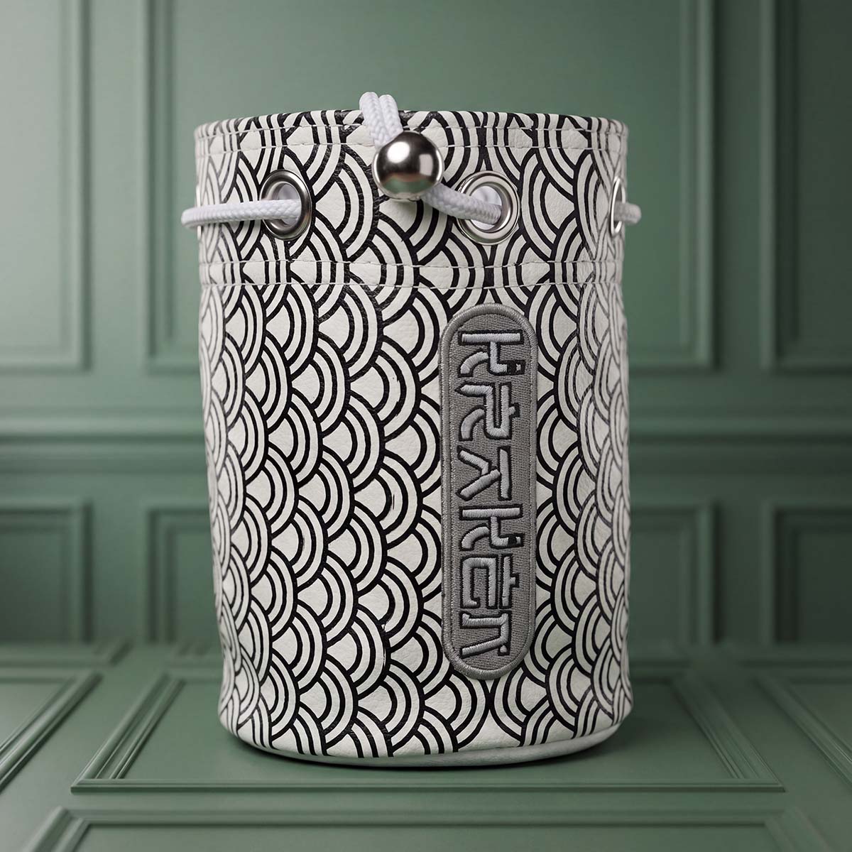 White Seigaiha golf valuables bag open showing light gray plush interior, white drawstring, and silver grommets, Kraken Golf