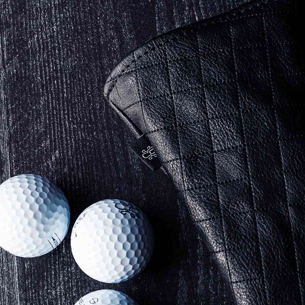 Black quilted hybrid headcover - Midnight Collection by Kraken Golf with chenille Kraken emblem and plush black fur interior