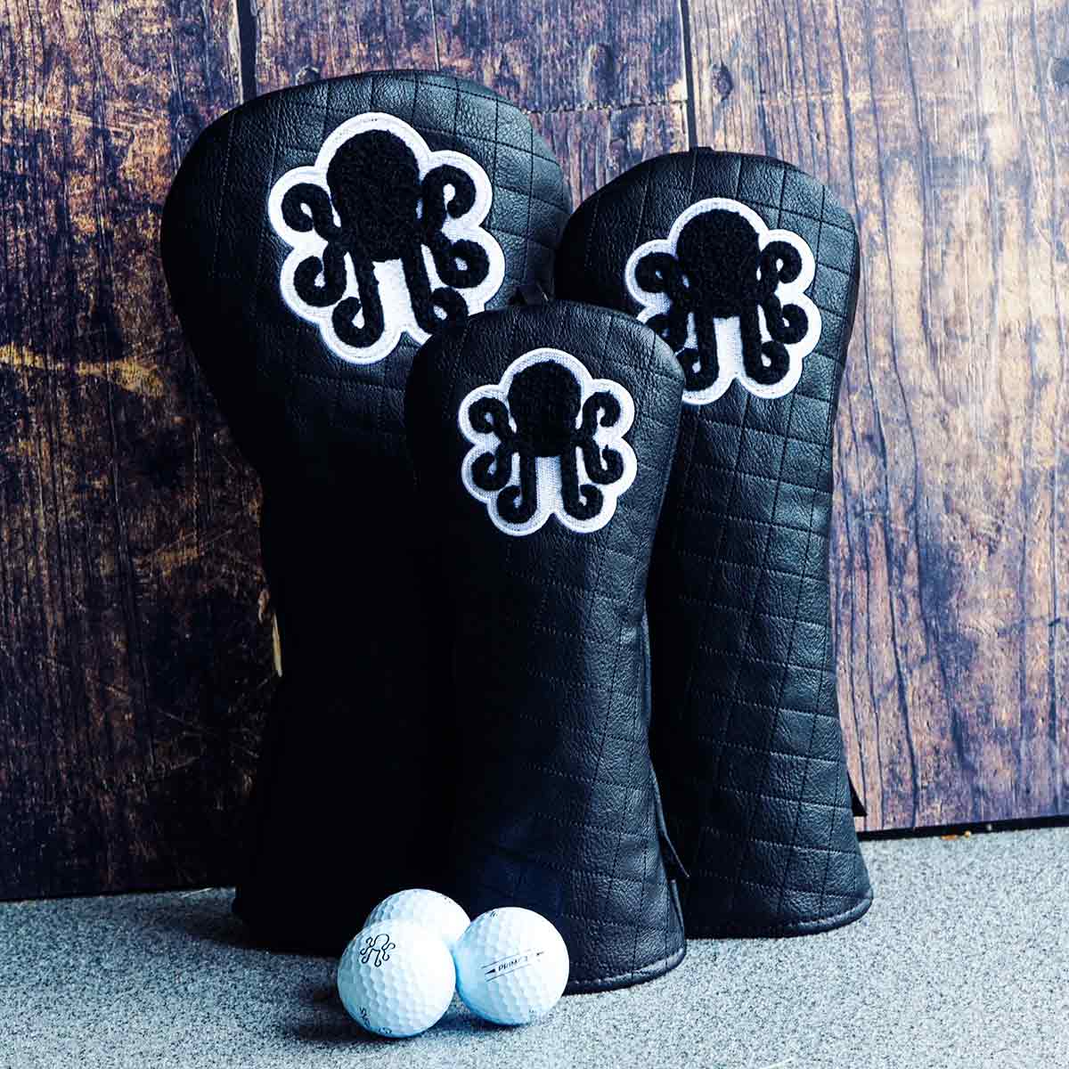 Black quilted driver headcover with chenille Kraken logo and white embroidery - Kraken Golf Midnight Collection
