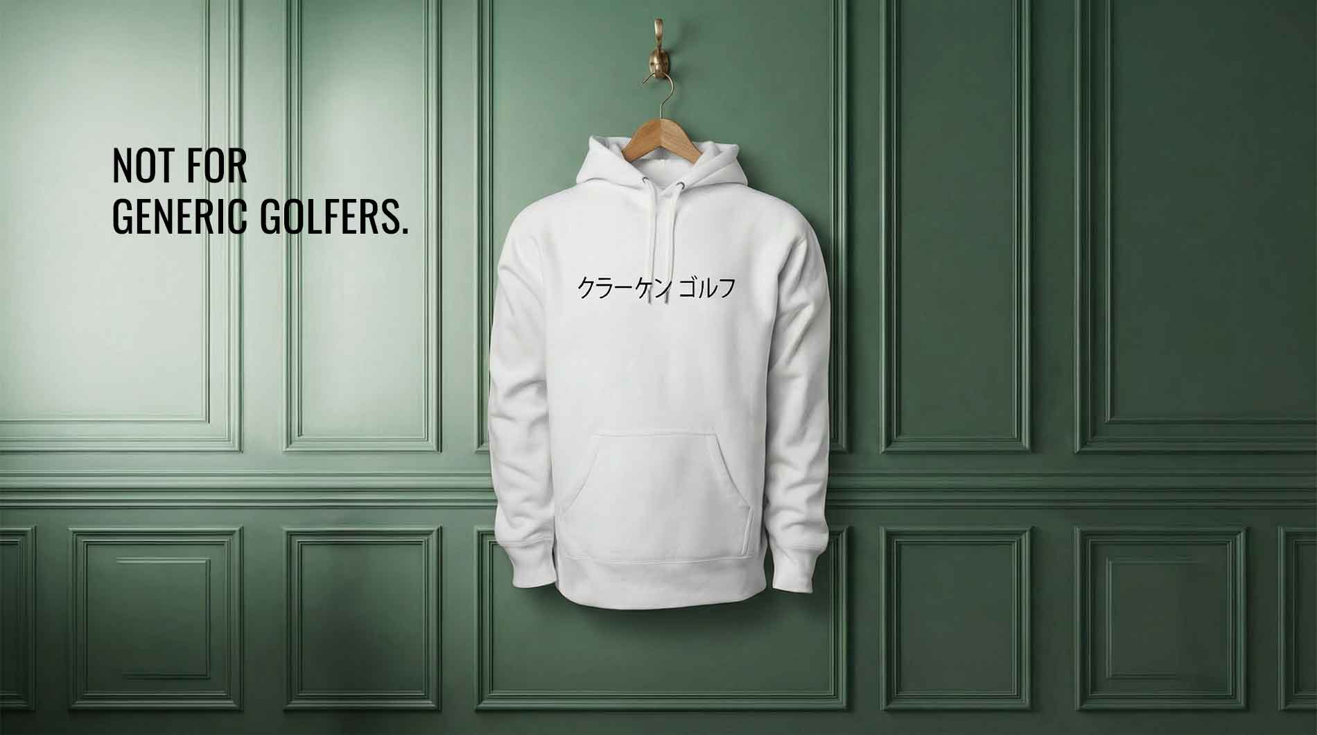 White Kraken hoodie with Japanese font text on a green paneled wall