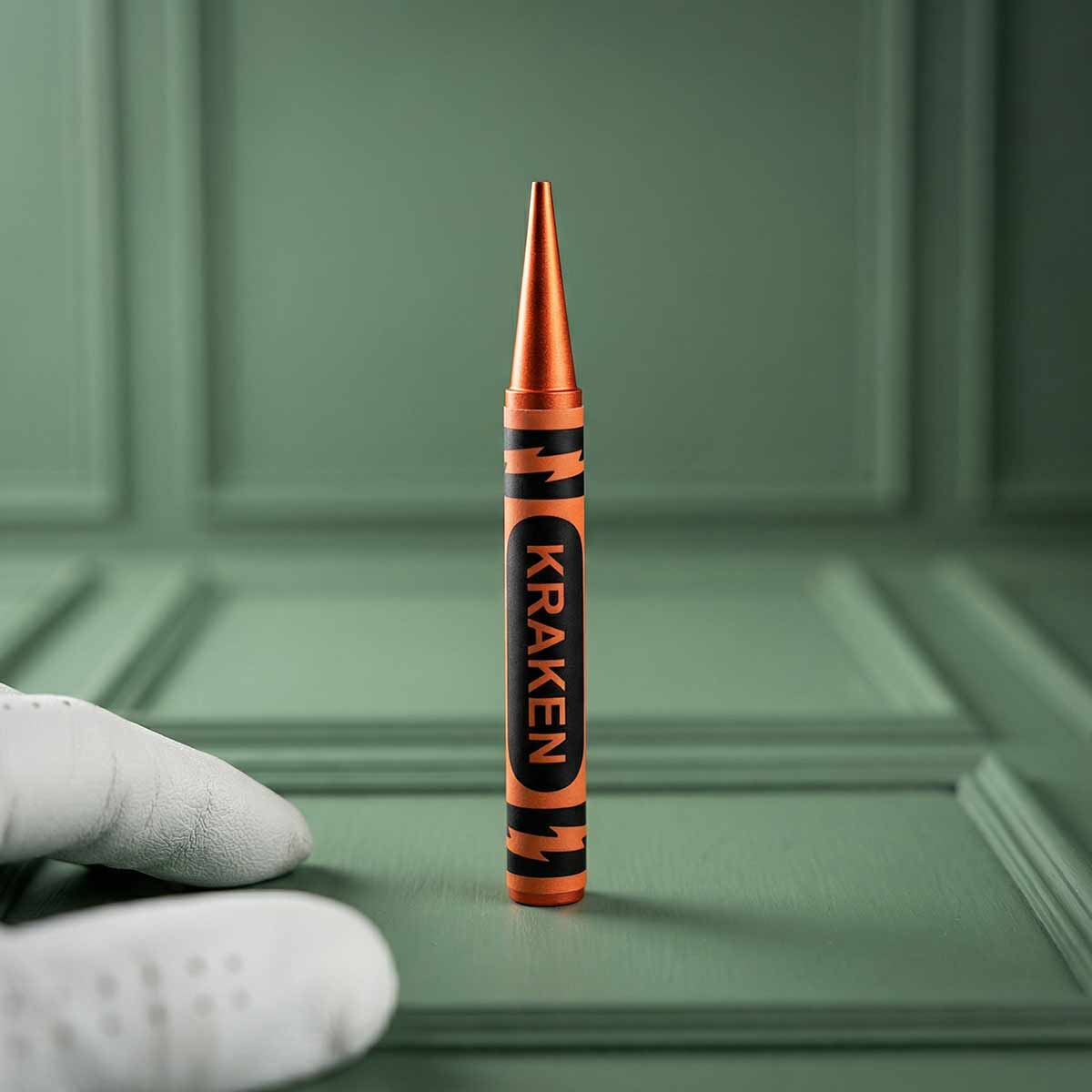 Kraken Orange Crayon Pitch Tool on green background