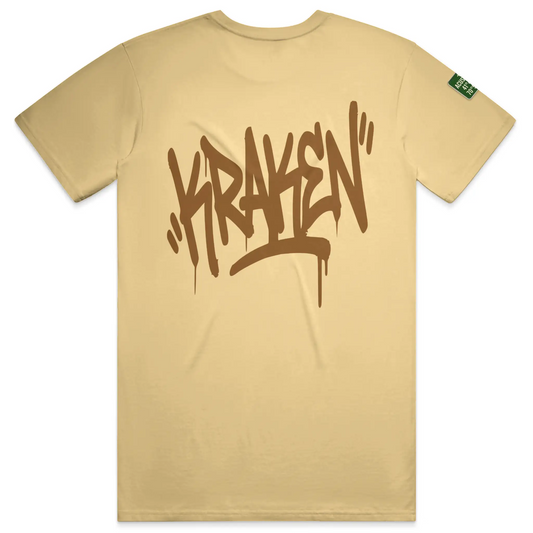 Butter Kraken Golf Origin tee with oversized brown graffiti Kraken tag printed across the back