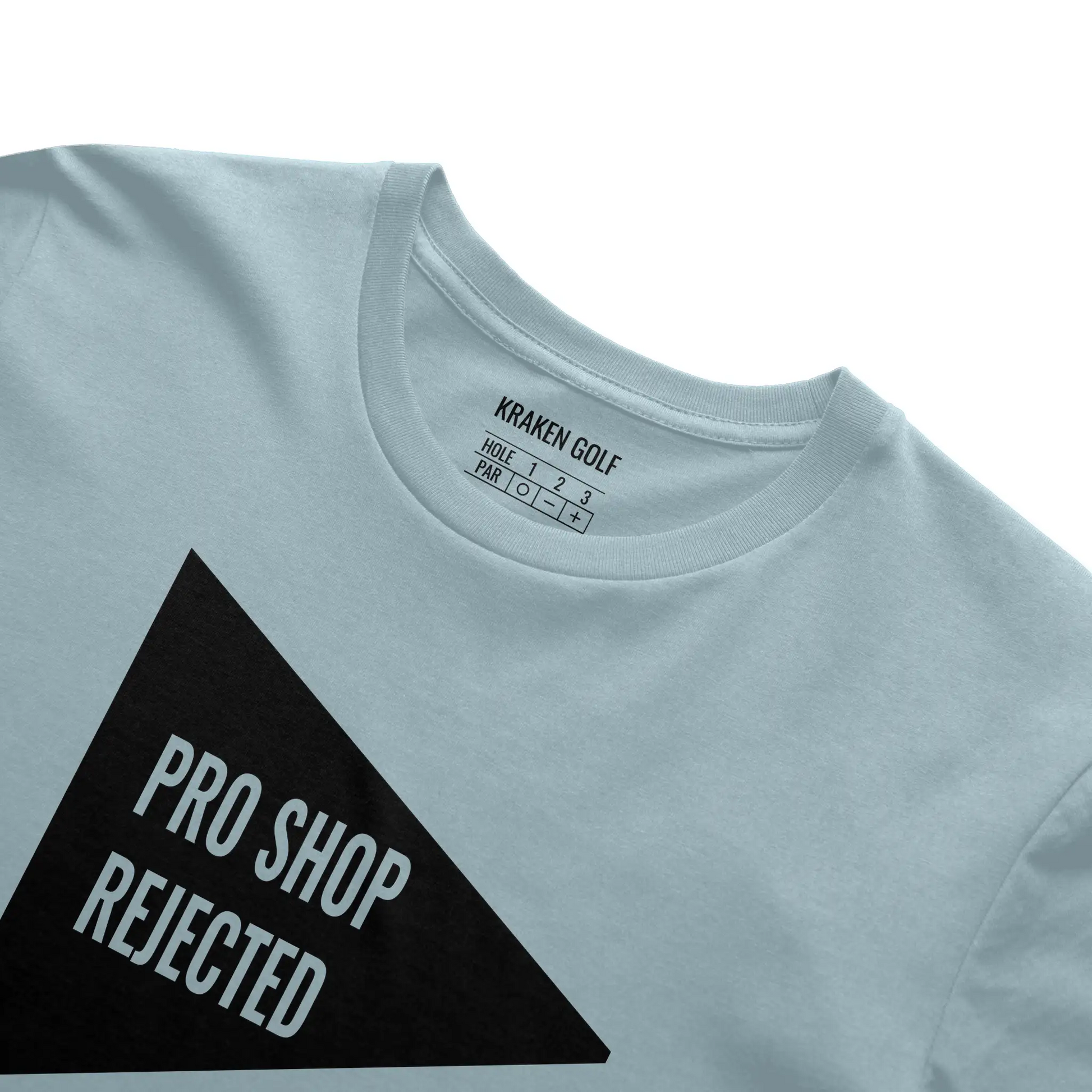 Close-up of the Pro Shop Rejected premium golf t-shirt in Harbor blue — black triangular flag graphic and Kraken Golf Co. inner neck tag detail