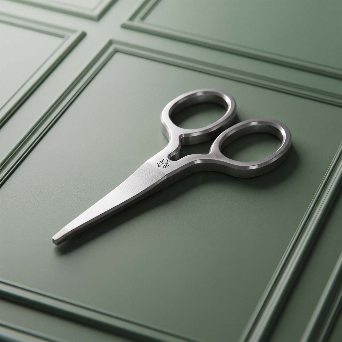 Production Shears stainless steel pitch tool by Kraken Golf, shear-shaped divot tool with micro-text engraving