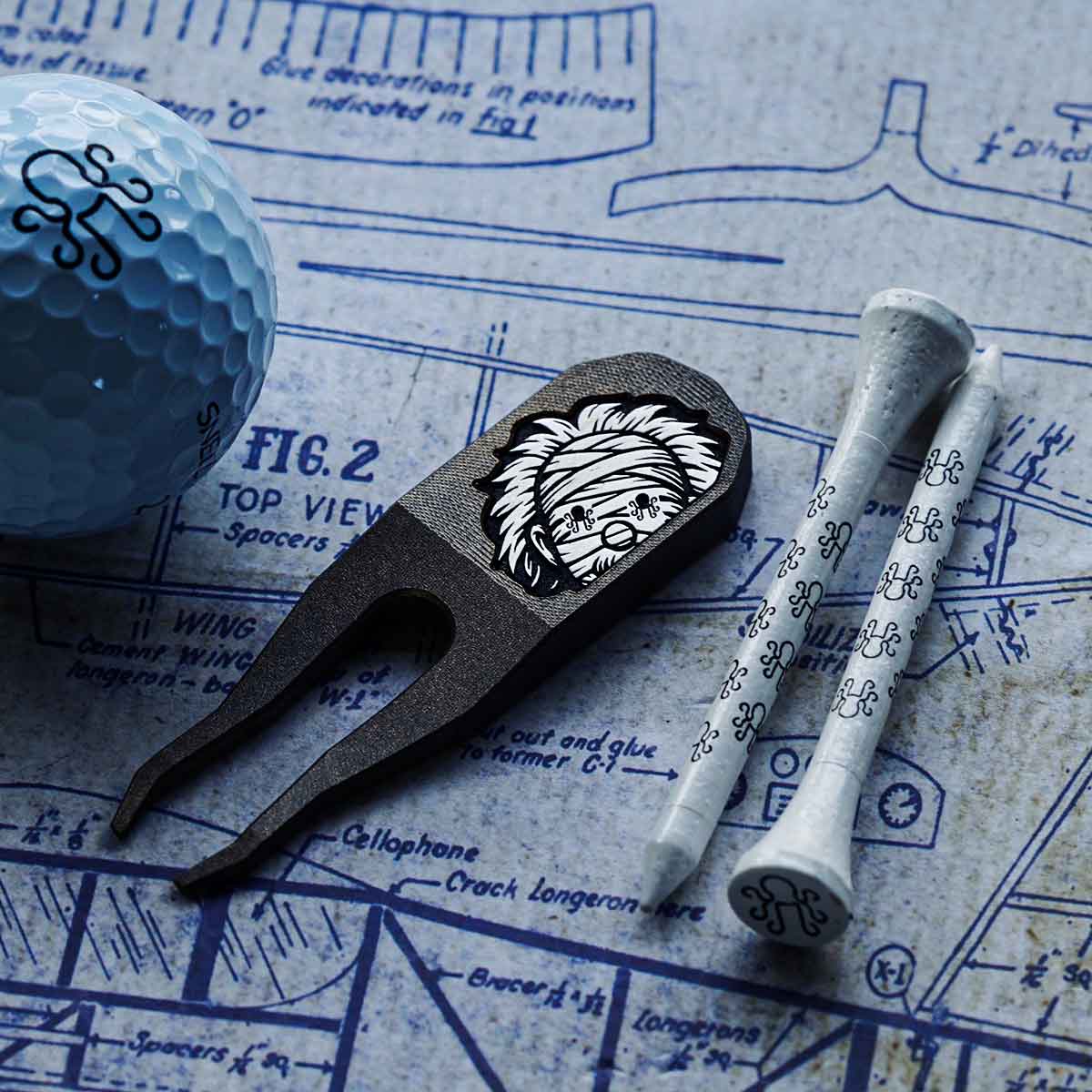 Halloween Einstein mummy divot tool in darkened brass with aluminum inlay by Kraken Golf