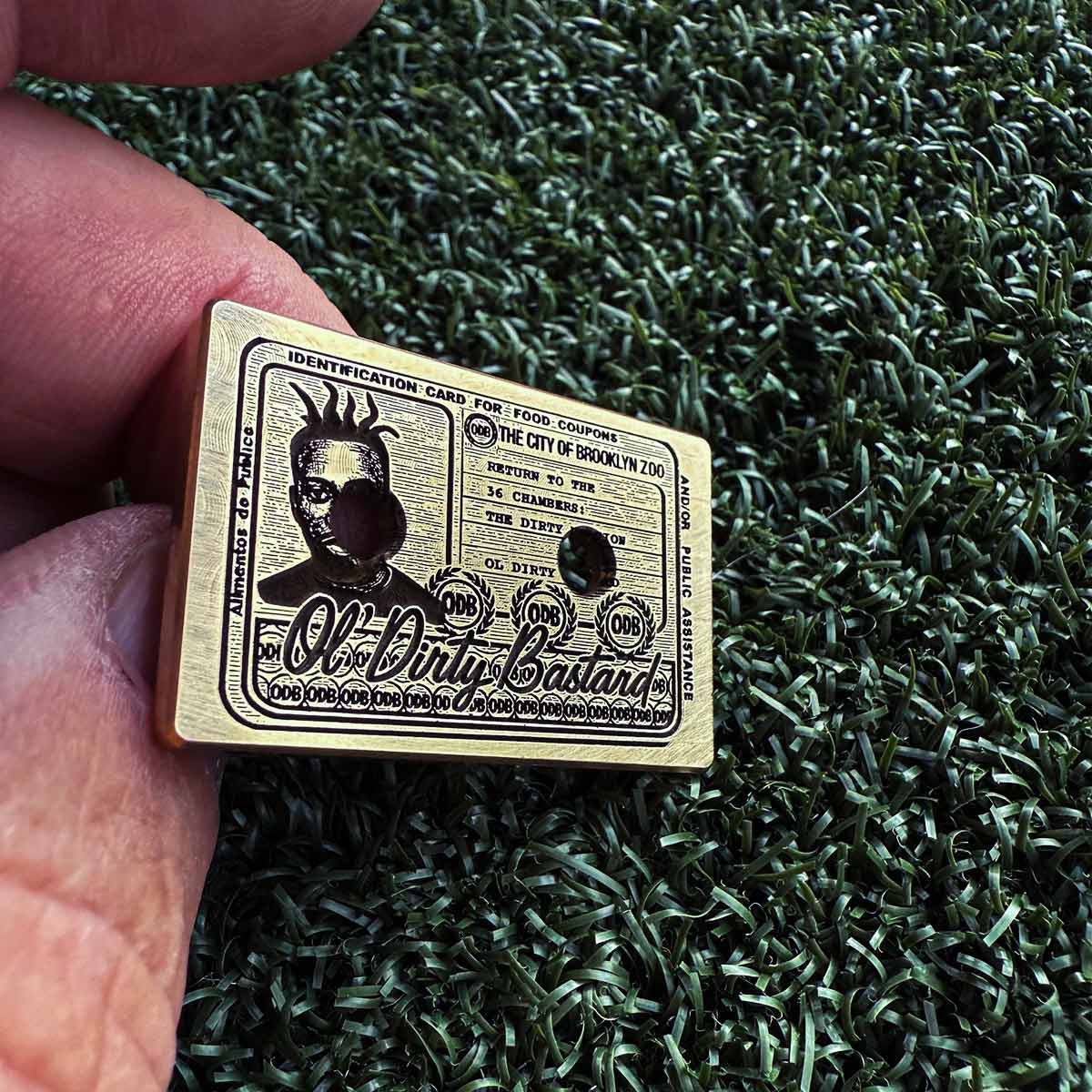 Shaolin Classic cassette ball marker displayed on putting green