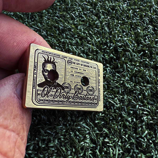 Shaolin Classic cassette ball marker displayed on putting green