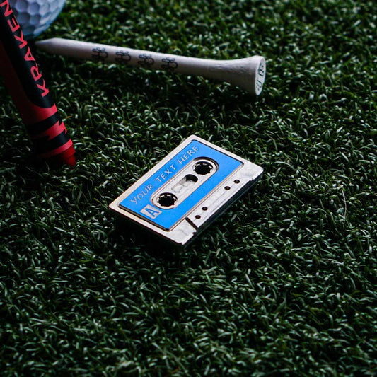 Side A: Legend custom cassette golf ball marker by Kraken Golf - stainless steel with blue aluminum inlay, personalized mixtape name