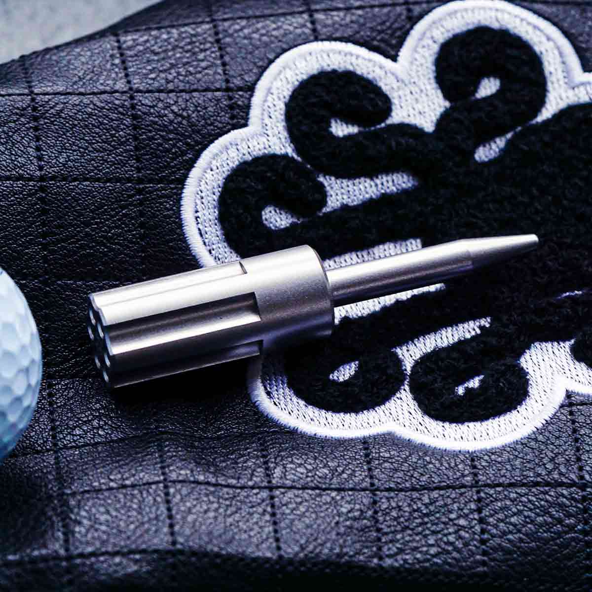 revolver barrel shapped golf pitch tool made by Kraken Golf