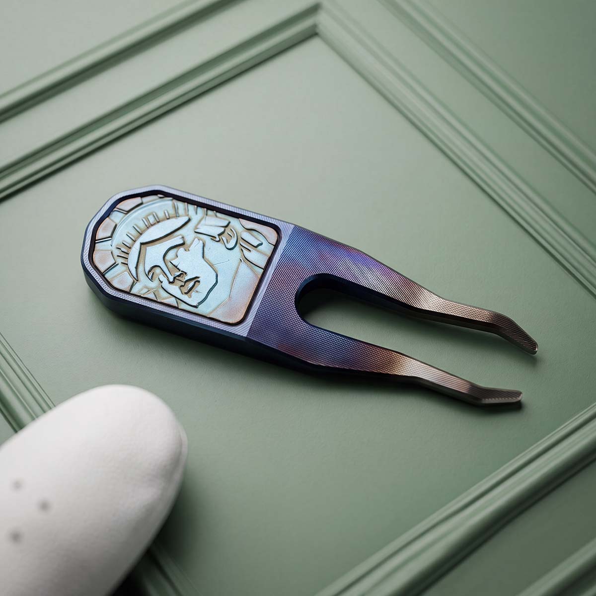 Kraken Golf Torchbearer carbon steel pitch tool, hand-torched blue and pink finish with copper patina Liberty face inlay